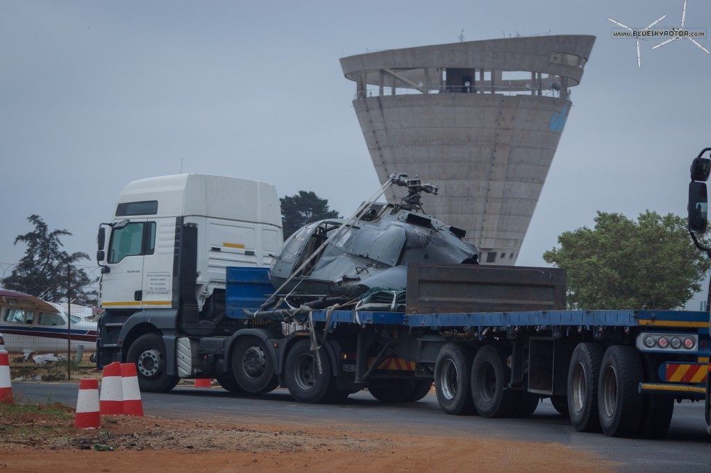 wreck of a first Bo-105 on a truck